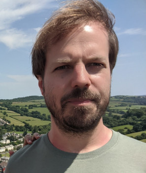 Dr Arkaitz Zubiaga looking at camera frowning